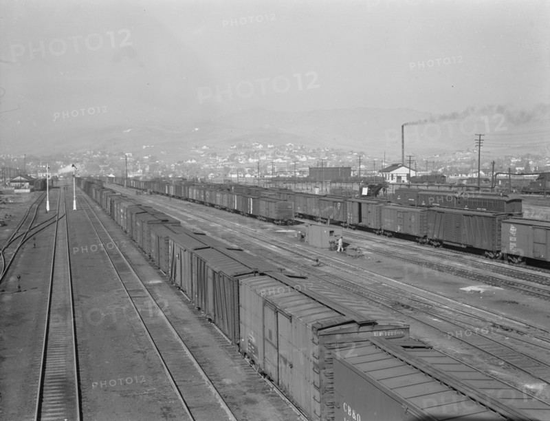 Railroad yard, outskirts of fast-growing town. Klamath Falls, Oregon.