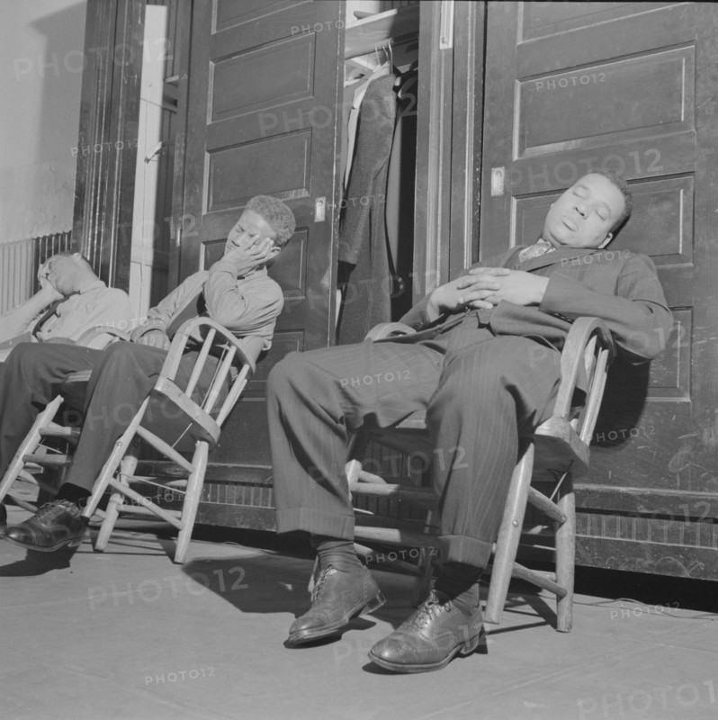 Washington, D.C. Firemen taking a nap in engine house number four.