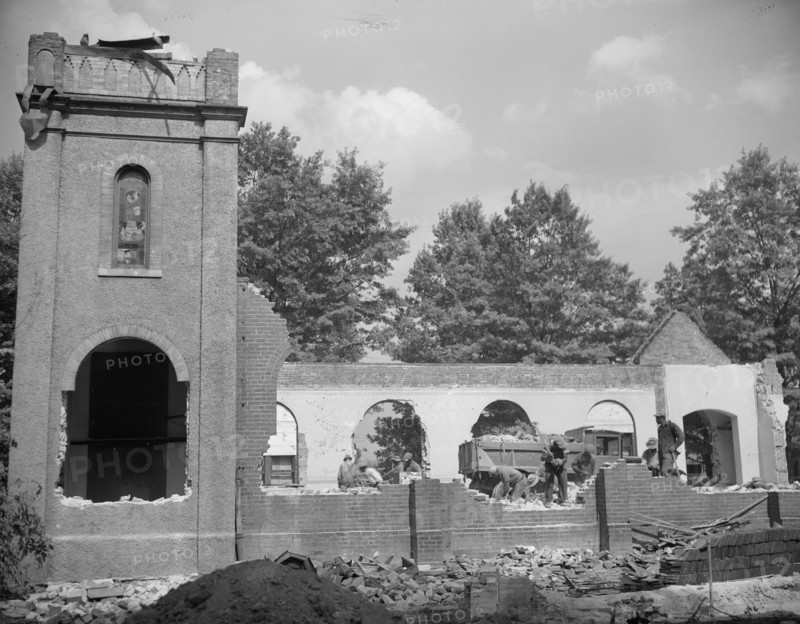Washington, D.C. Laborers wrecking houses on Independence Avenue.