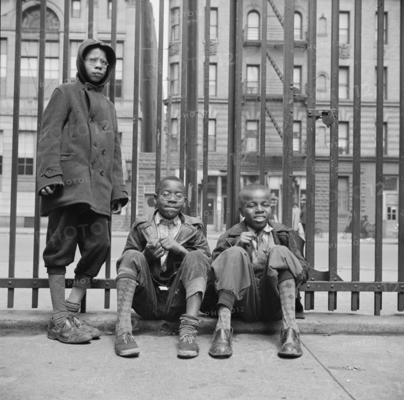 New York, New York. Three boys who live in the Harlem area.
