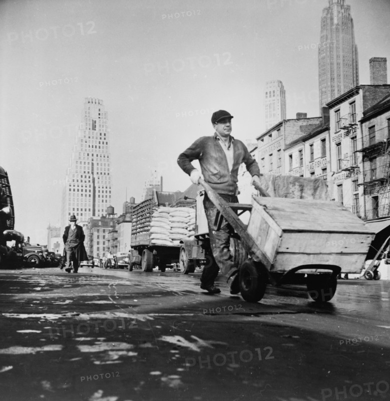 New York, New York. Fulton fish market street scene.