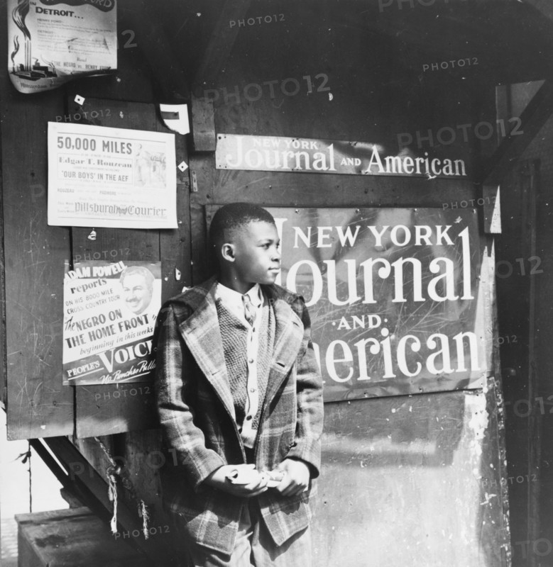 New York, New York. Harlem newsboy.