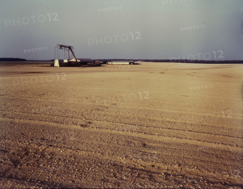 Bean canning factory in the field, Seabrook farm, Bridgeton, N.J., 1942. Creator: John Collier.