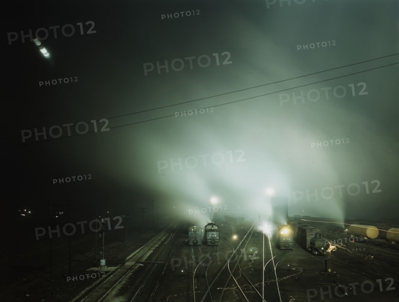 Night view of part of Santa Fe R.R. yard, Kansas City, Kansas, 1943. Creator: Jack Delano.