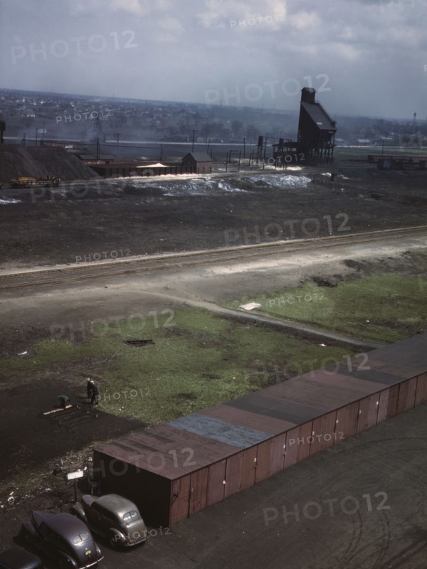 C & NW RR railroad workers cultivating a little Victory garden at Proviso yard, Chicago, Ill., 1943. Creator: Jack Delano.
