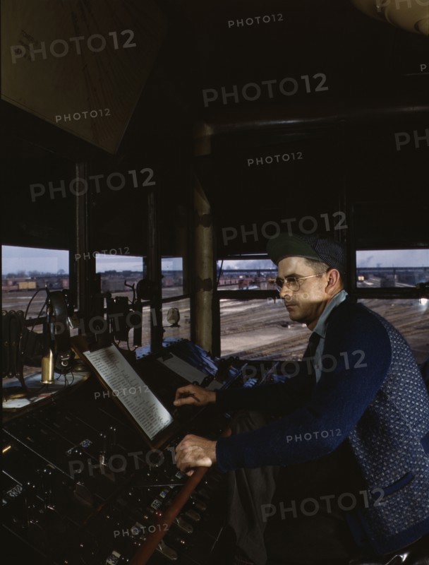 C&NWRR towerman R.W. Mayberry of Elmhurst, Ill., at the Proviso yard, Melrose Park, Ill., 1943. Creator: Jack Delano.