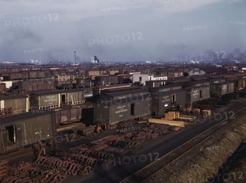 Freight cars being maneuvered in a Chicago and North Western railroad yard, Chicago, Ill., 1942. Creator: Jack Delano.
