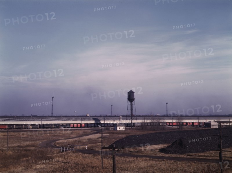 Truck trailers loading and unloading at C & NW RR's Proviso yard, Chicago, Ill., 1942. Creator: Jack Delano.