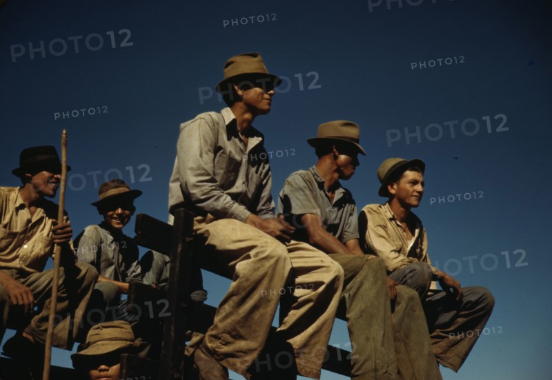Sugar cane workers resting at the noon hour, Rio Piedras, Puerto Rico, 1941. Creator: Jack Delano.