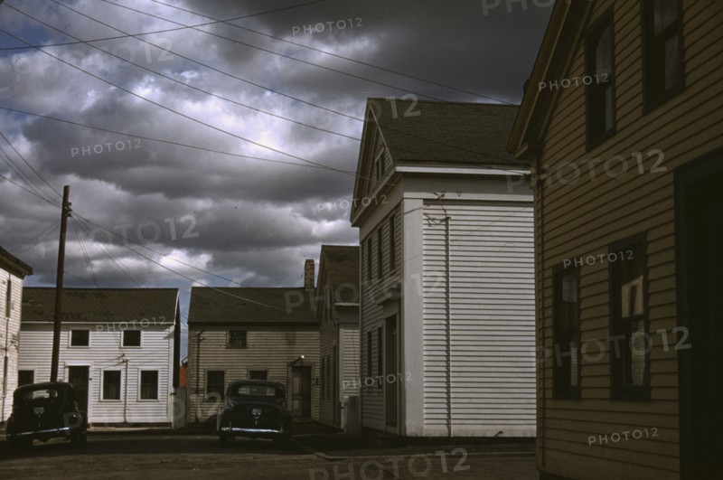 A square with old houses in an old fishing village, Stonington, Conn., 1940. Creator: Jack Delano.