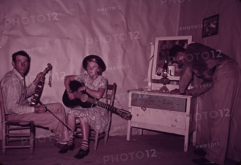 Orchestra during intermission at square dance, McIntosh County, Oklahoma, 1939 or 1940. Creator: Russell Lee.