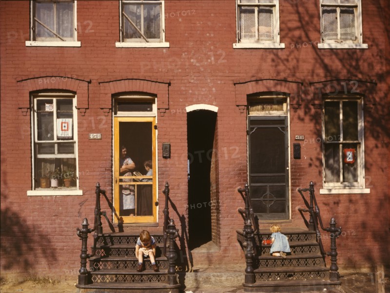 Children on row house steps, Washington, D.C., between 1941 and 1942. Creator: Louise Rosskam.