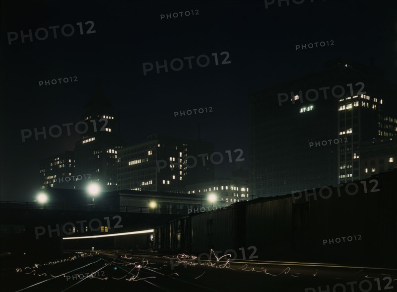 Night view of part of the South Water street freight terminal...Illinois Central R.R., Chicago, 1943 Creator: Jack Delano.