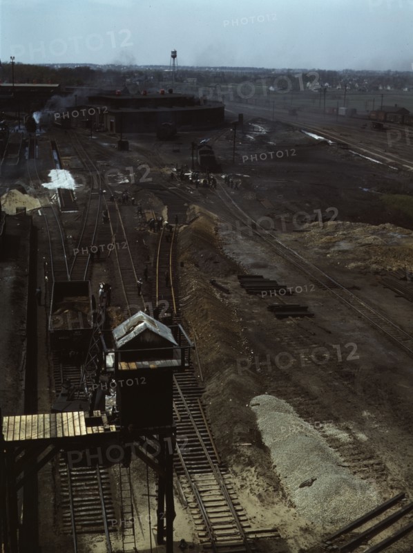 Track repair work at the Bensenville yard of the Chicago, Milwaukee..., Illinois, 1943. Creator: Jack Delano.