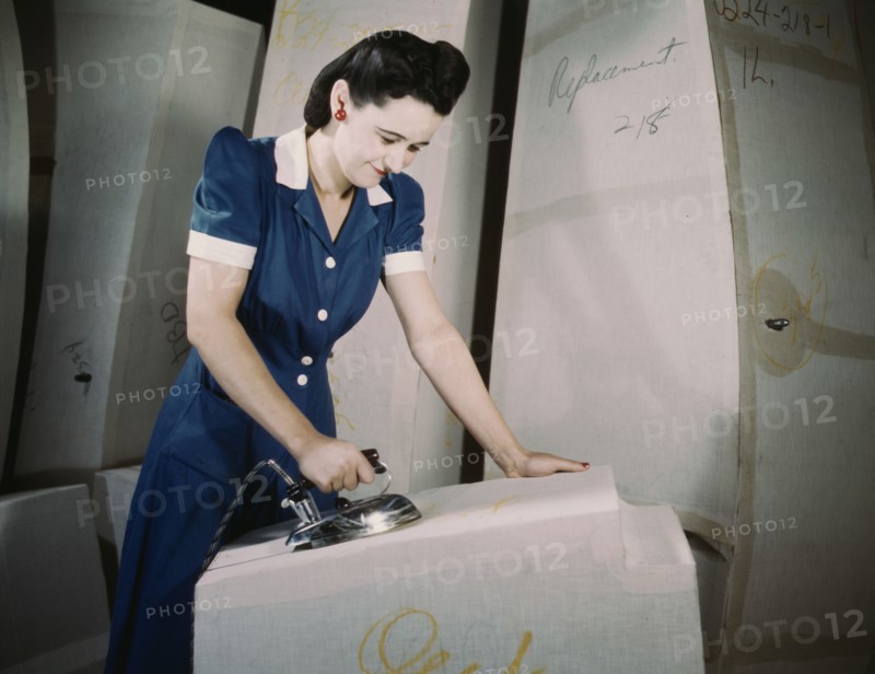 Manufacture of self-sealing gas tanks, Goodyear Tire and Rubber Co., Akron, Ohio, 1941. Creator: Alfred T Palmer.