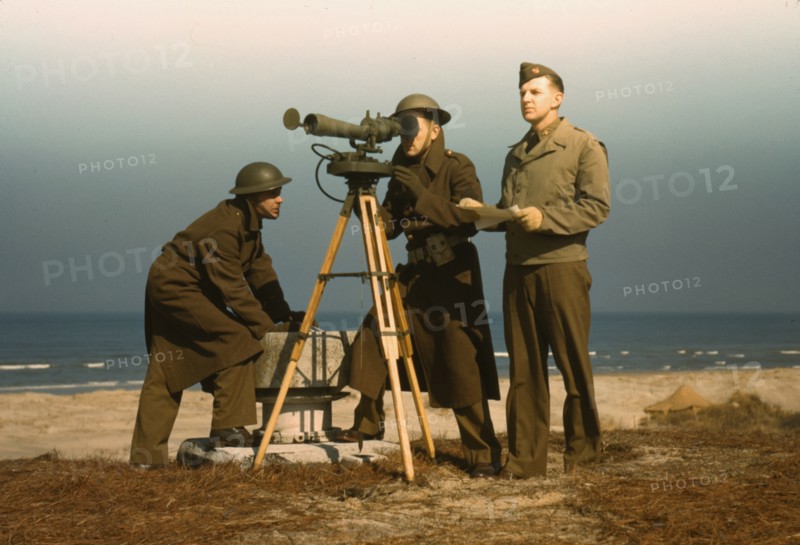 Men of Fort Story operate an azimuth instrument, to measure the angle..., Fort Story, Va., 1942. Creator: Alfred T Palmer.