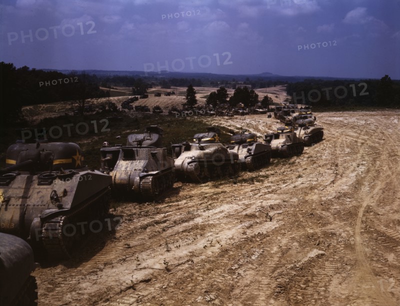 Parade of M-4 (General Sherman) and M-3 (General Grant) tanks in training ..., Ft. Knox, Ky., 1942. Creator: Alfred T Palmer.