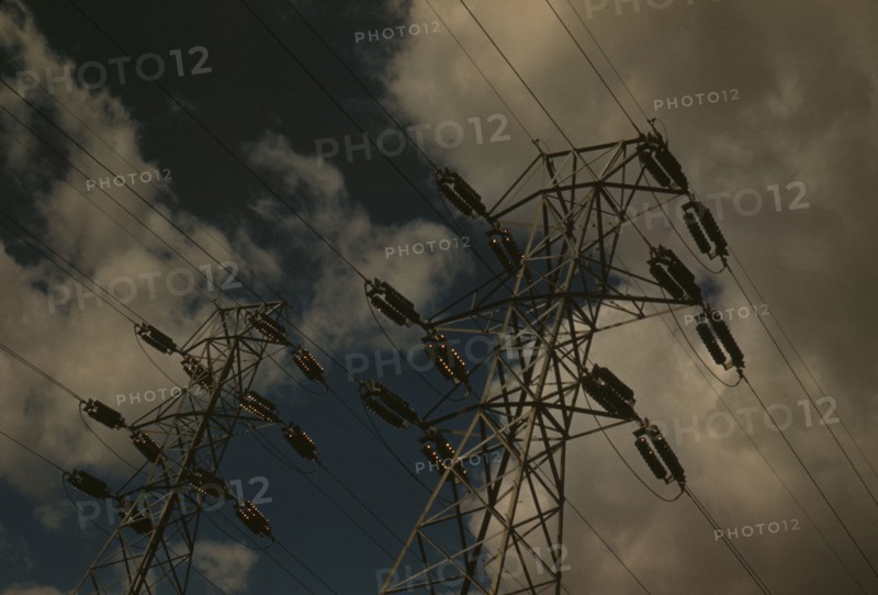 Insulators and transmission wires in the switchyard of the TVA's Chickamauga Dam..., Tennessee, 1942 Creator: Alfred T Palmer.
