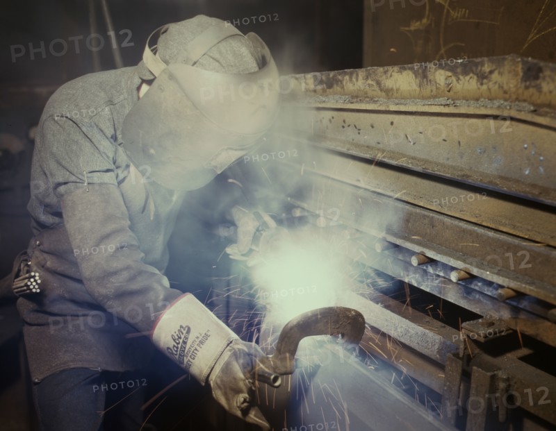 Welder making boilers for a ship, Combustion Engineering Co., Chattanooga, Tenn., 1942. Creator: Alfred T Palmer.