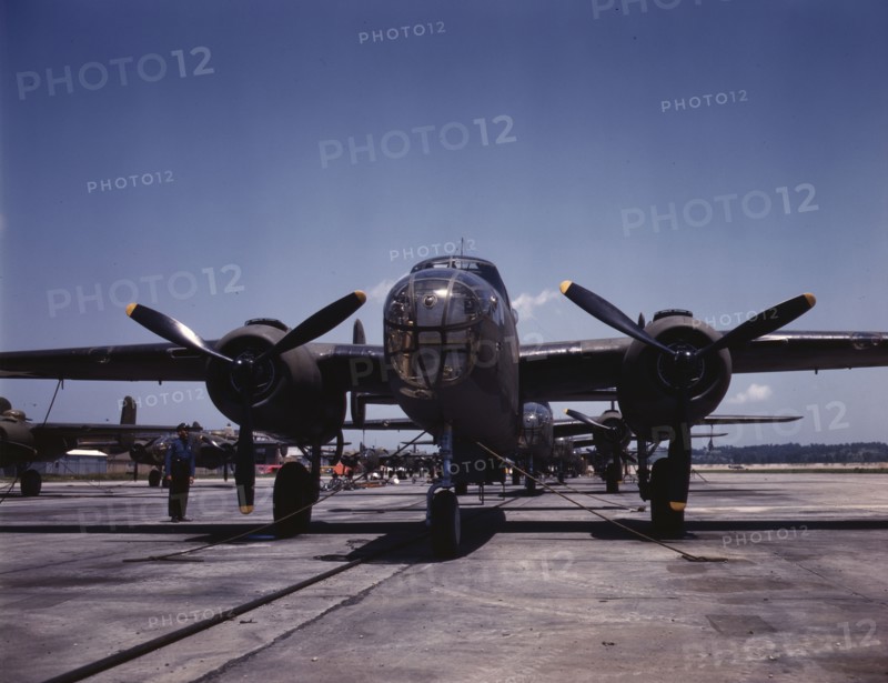 B-25 bombers on the outdoor assembly line at North American Aviation..., Kansas City, Kansas, 1942. Creator: Alfred T Palmer.