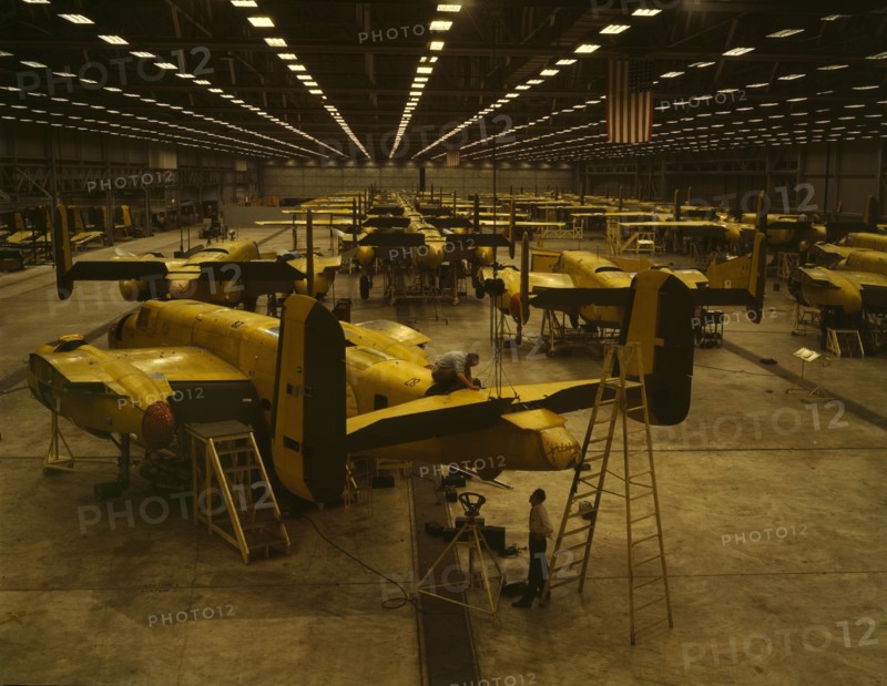Assembling B-25 bombers at North American Aviation, Kansas City, Kansas, 1942. Creator: Alfred T Palmer.