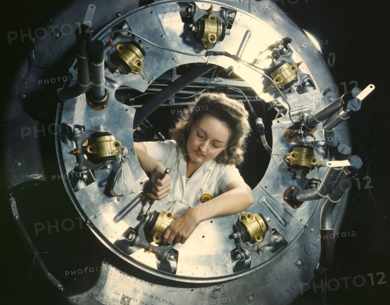 Part of the cowling for one of the motors...North American Aviation, Inc., Inglewood, Calif., 1942. Creator: Alfred T Palmer.