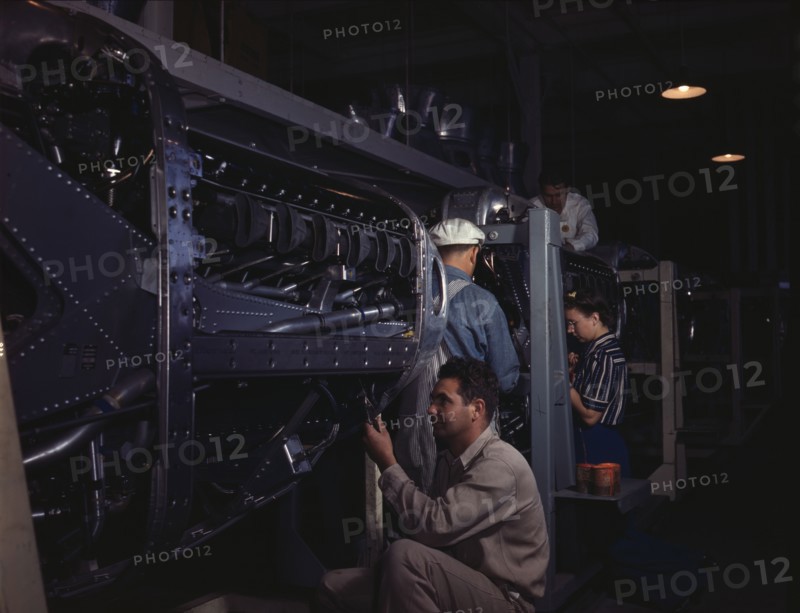Employees at North American Aviation, Incorporated, assembling..., Inglewood, Calif., 1942. Creator: Alfred T Palmer.