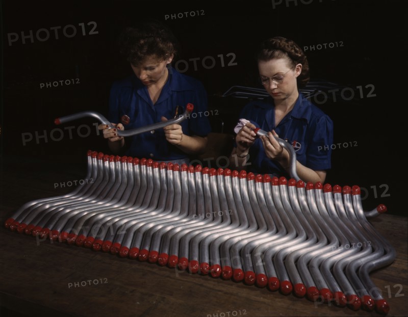 Capping and inspecting tubing: two women are shown...at Vultee's Nashville division, Tennessee, 1943 Creator: Alfred T Palmer.