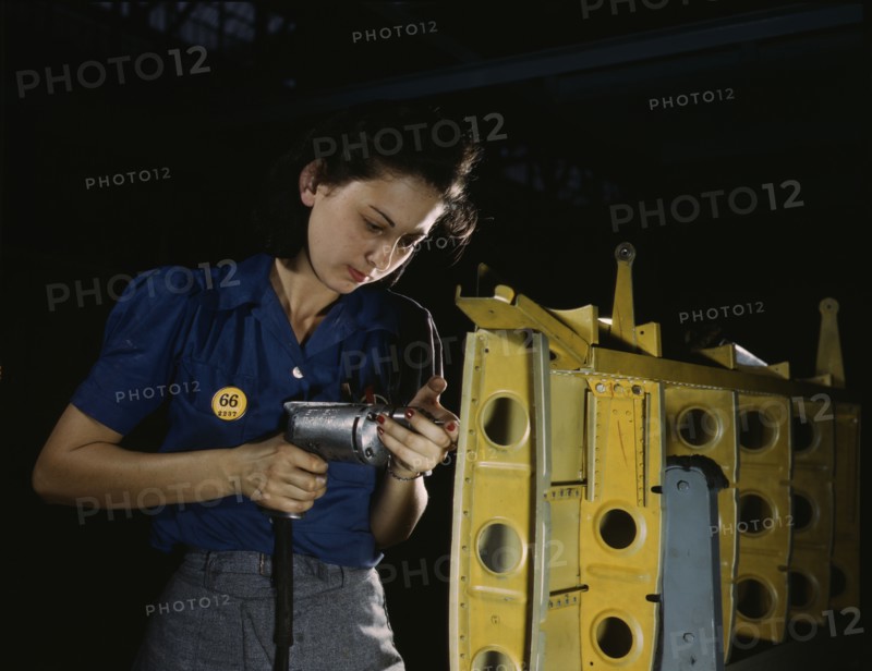 Drilling horizontal stabilizers...this woman worker at Vultee-Nashville..., Tennessee, 1943. Creator: Alfred T Palmer.