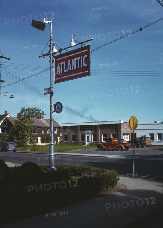Street scene, with building of the Southington News, Southington, Connecticut, 1942. Creator: Charles Fenno Jacobs.