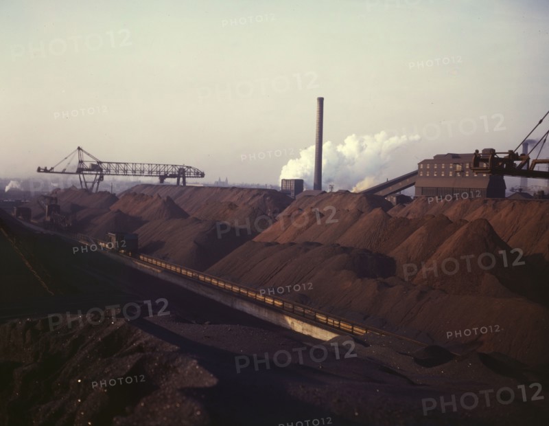Hanna furnaces of the Great Lakes Steel Coporation, stock pile of coal and..., Detroit, Mich., 1942. Creator: Arthur S Siegel.