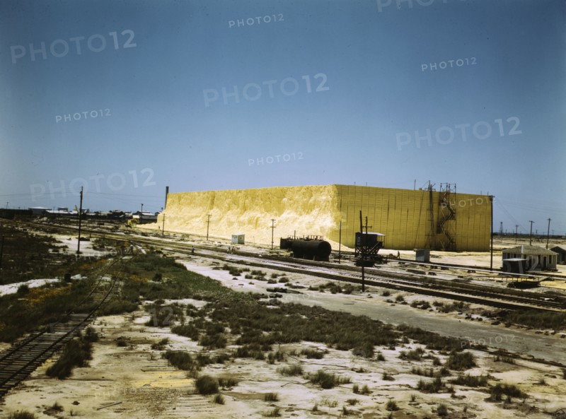 60 foot high sulphur vat, Freeport Sulphur Co., Hoskins Mound, Texas, 1943. Creator: John Vachon.