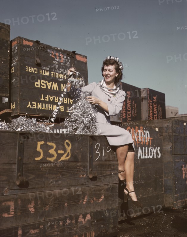 Annette del Sur publicizing salvage campaign...Douglas Aircraft Company, Long Beach, Calif., 1942. Creator: Alfred T Palmer.
