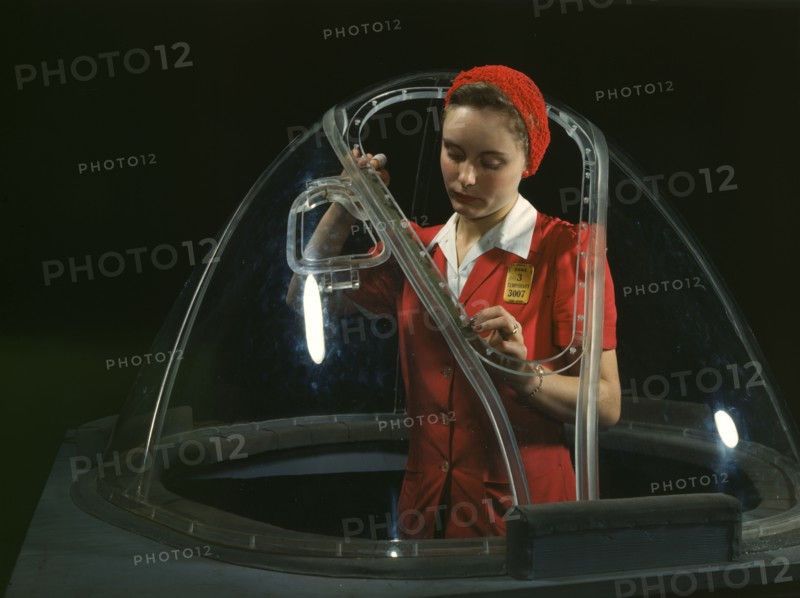 This girl in a glass house is putting finishing touches..., Long Beach, Calif. , 1942. Creator: Alfred T Palmer.