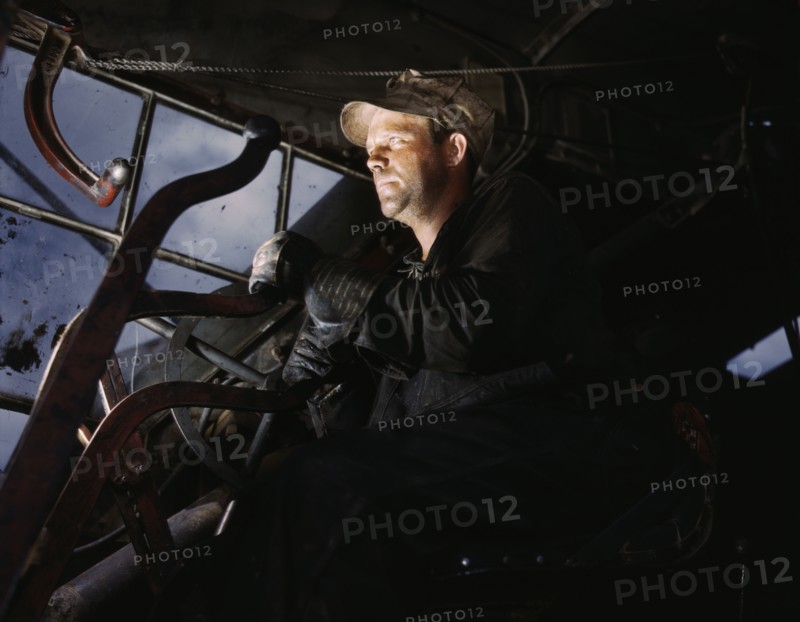 Crane operator at TVA's Douglas Dam, Tennessee, 1942. Creator: Alfred T Palmer.