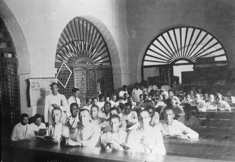 Puerto Rico Schools, 1912. [Men in a classroom].