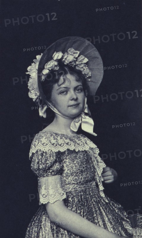 Woman wearing a bonnet, c1900.