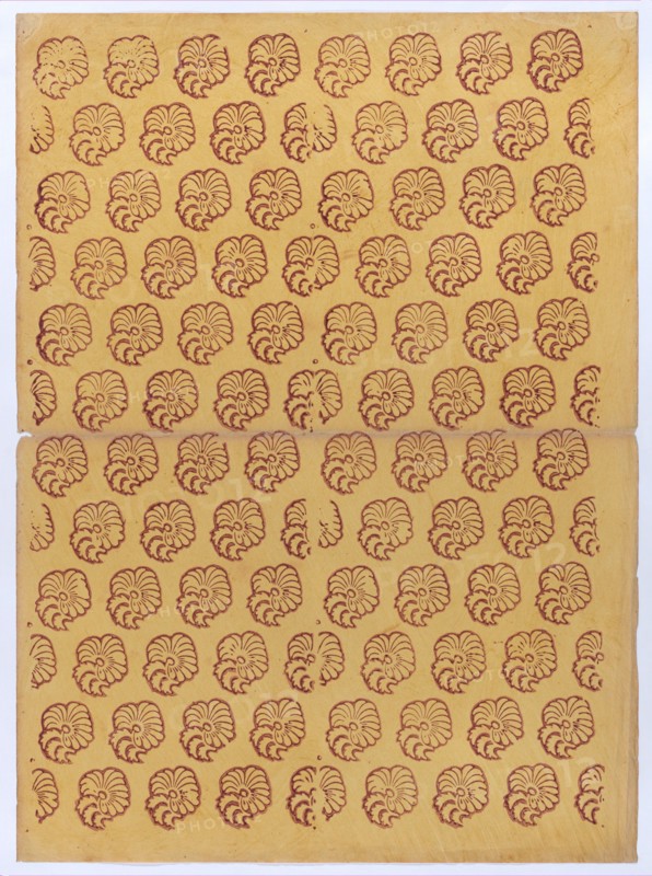 Yellow sheet with overall red abstract pattern, 19th century.