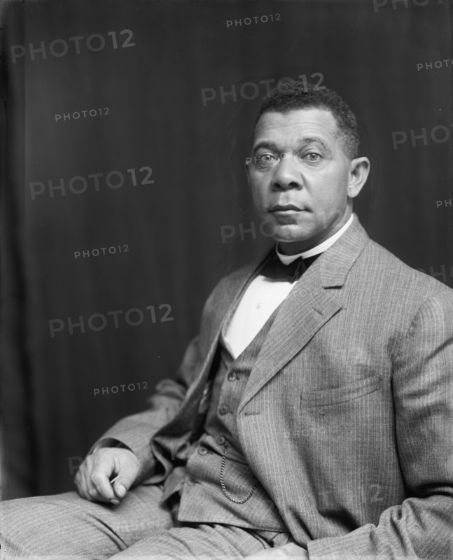 Booker T. Washington, half-length portrait, seated, c1895.