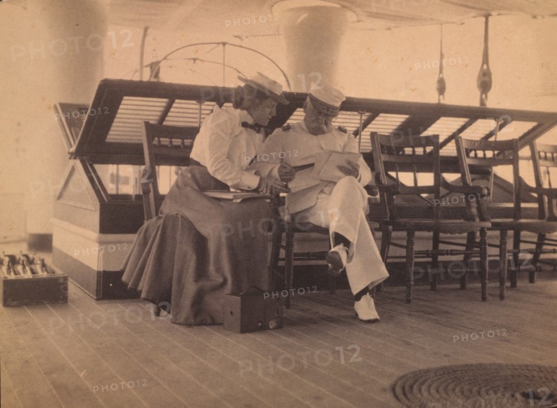 Frances B. Johnston and Admiral Dewey on the deck of the U.S.S. Olympia, 1899.