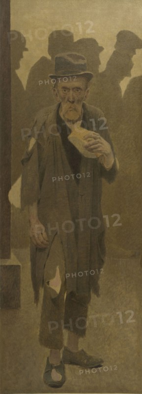 La Bouchée de pain : vieil homme en haillons, de face, tenant un morceau de pain, c.1904.