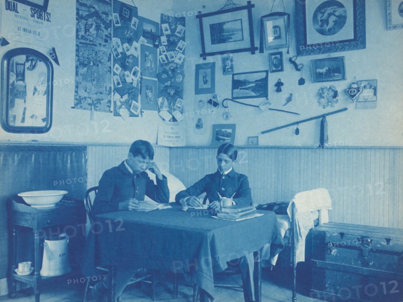 Carlisle Indian School, Carlisle, Pa. Two boys studying in dormitory room, 1901.