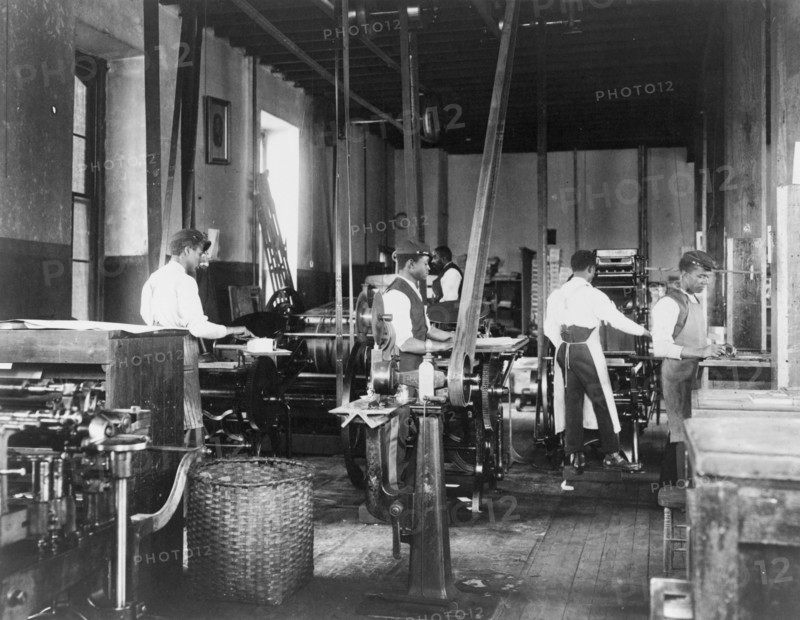 Pressmen at work in printing shop, Hampton Institute, Hampton, Virginia, 1899 or1900.