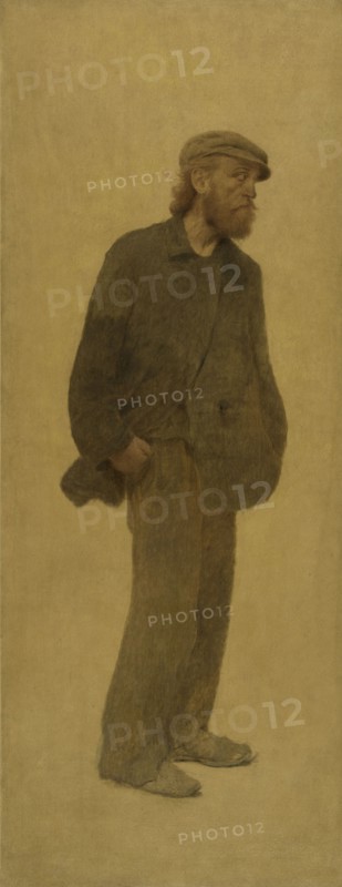La Bouchée de pain : homme de trois-quarts coiffé d'une casquette, mains dans les poches, c.1904.
