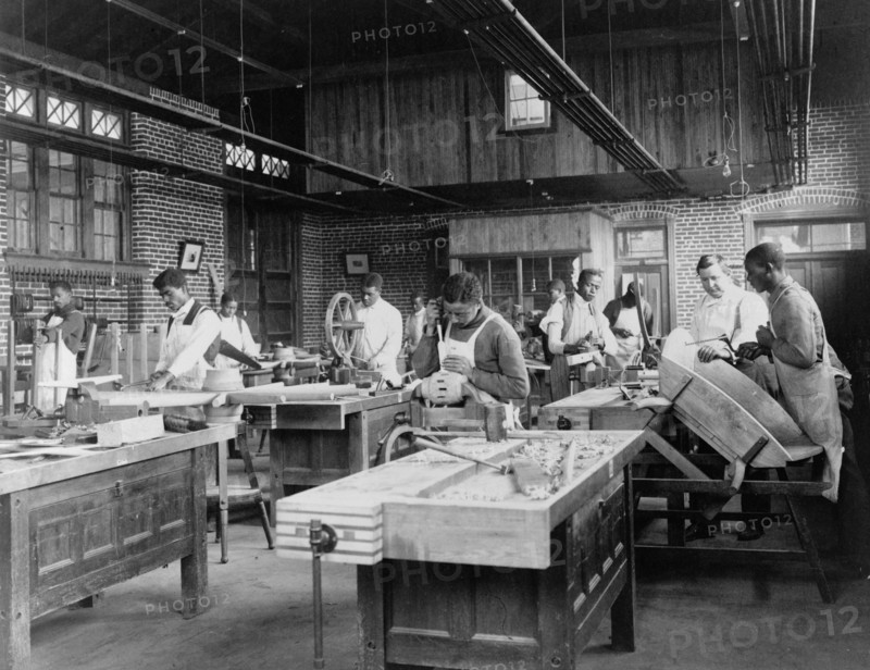 Young men training in wheel wrighting at Hampton Institute, Hampton, Virginia, 1899 or 1900.