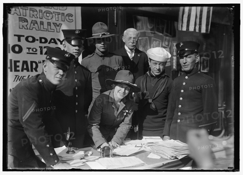 Dora Rodrigues, recruiter for service branches, possibly in front of the Cosmos Theater..., May 1917 Creator: Harris & Ewing.