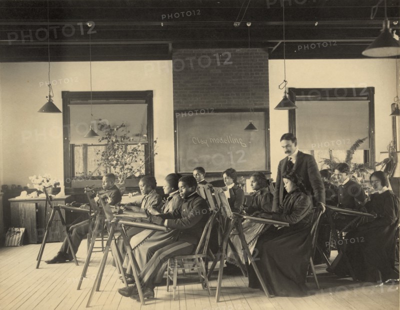 Formal class in liberal arts and sciences Hampton Institute, Hampton, Va. -writing..., 1899 or 1900. Creator: Frances Benjamin Johnston.