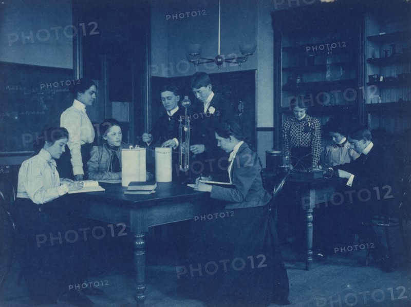Students conducting electrical experiments with batteries, Western High School, Washington, D.C., (1899?).