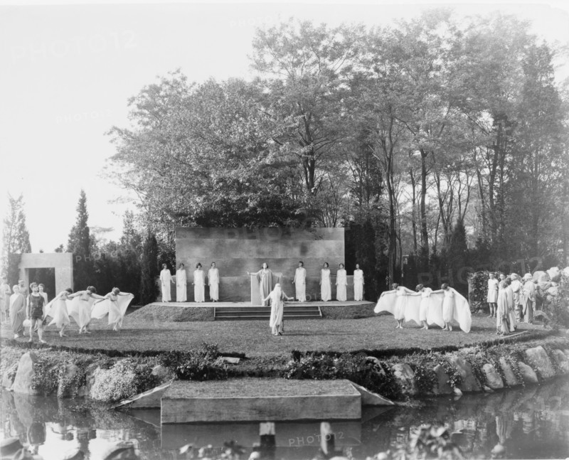 Outdoor dance performance with dancers in classical drapery, possibly in Long Island, between 1900 and 1915.