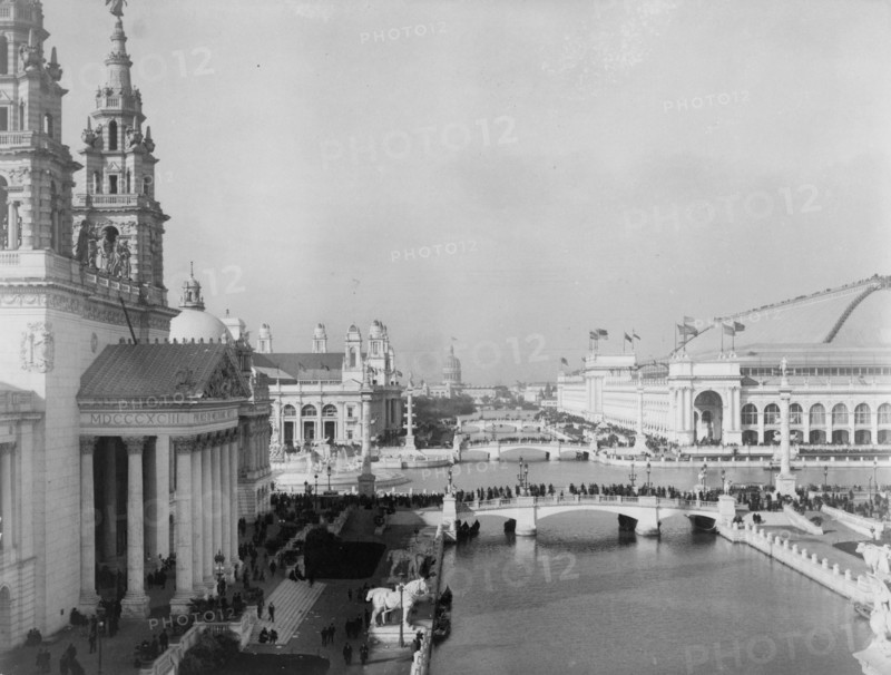 Bird's-eye view of exposition grounds, with canal in foreground, World's Columbian Expo..., 1893. Creator: Frances Benjamin Johnston.